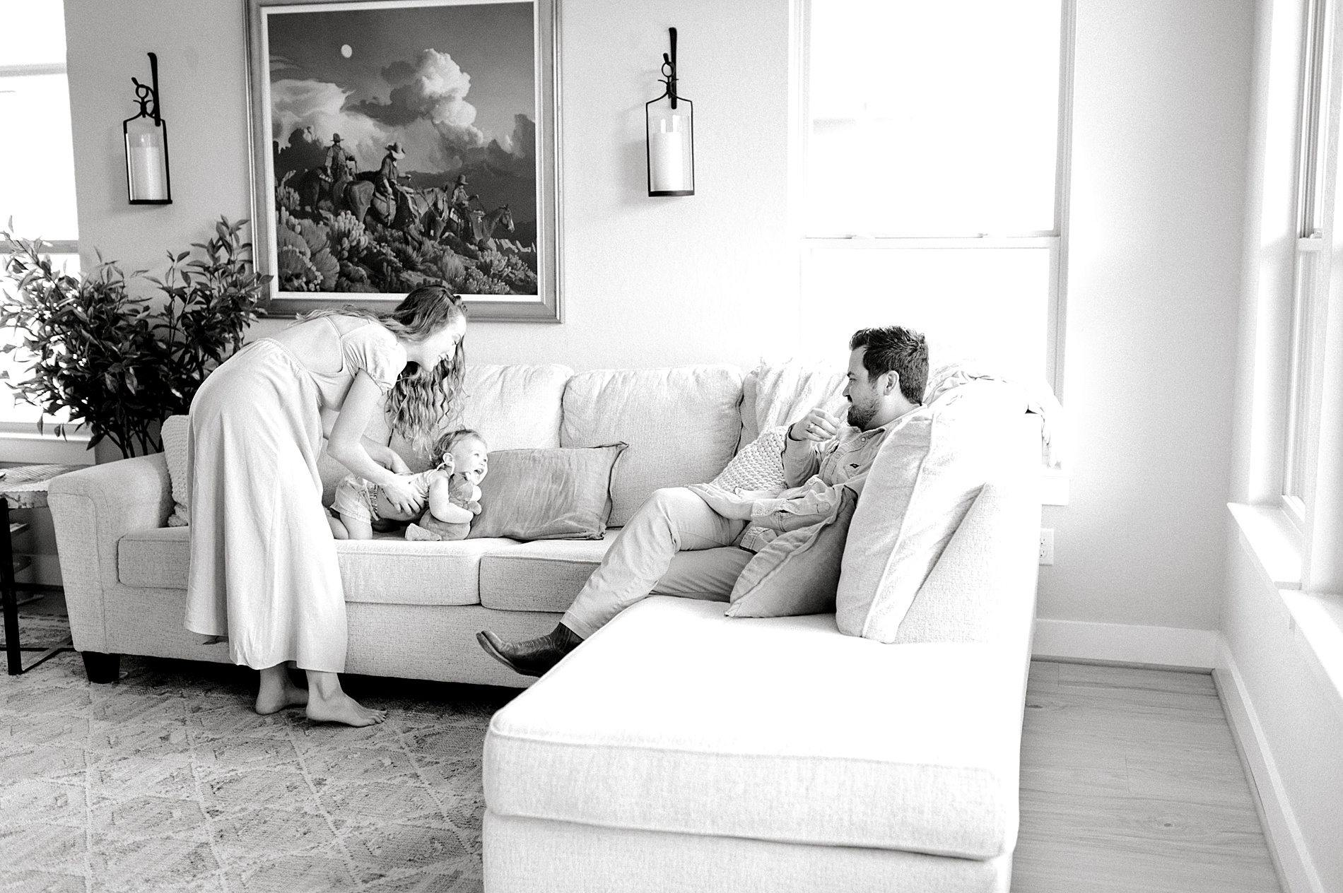 family of three in living room