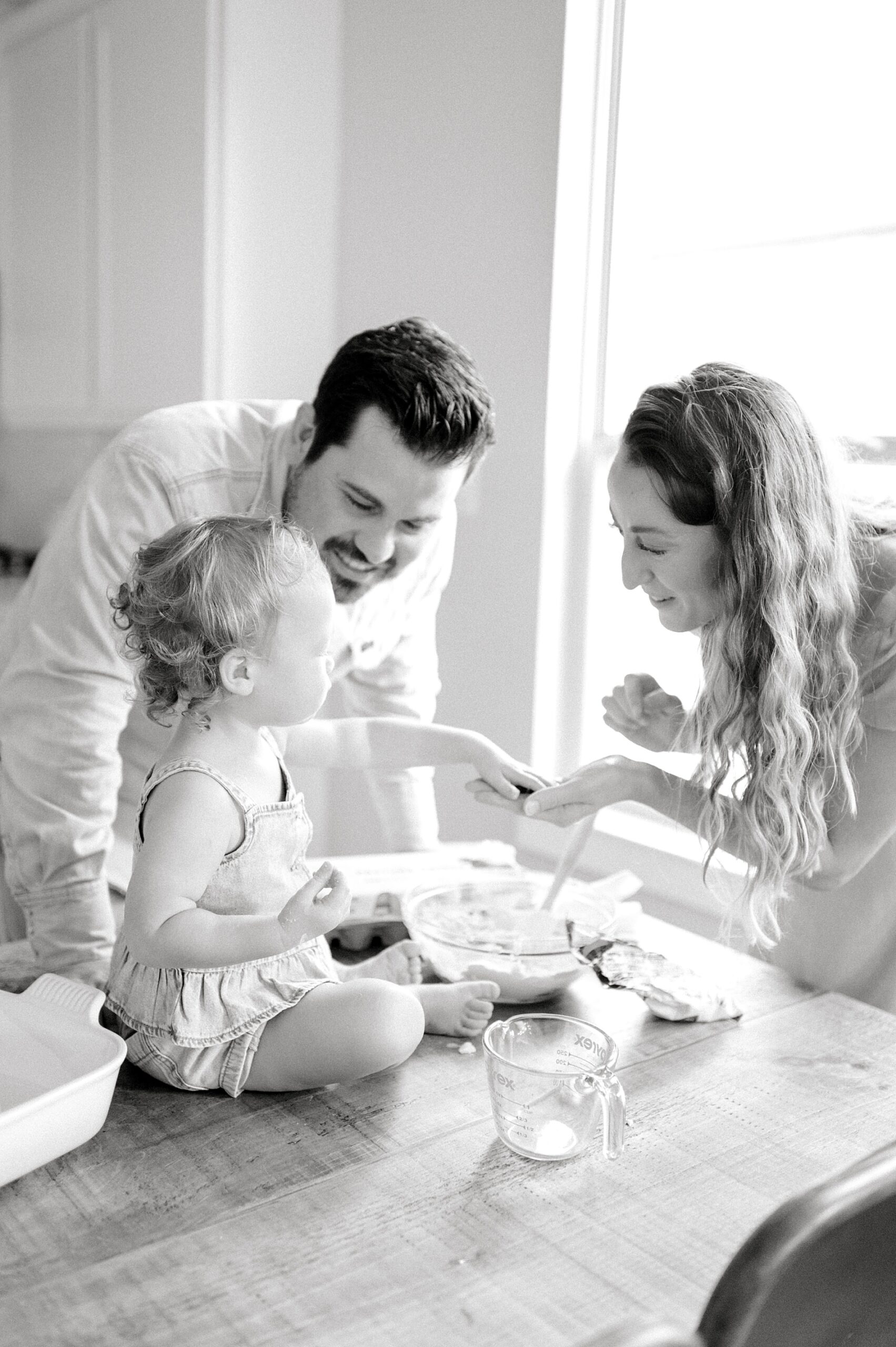 Candid In-Home Family Session of family baking