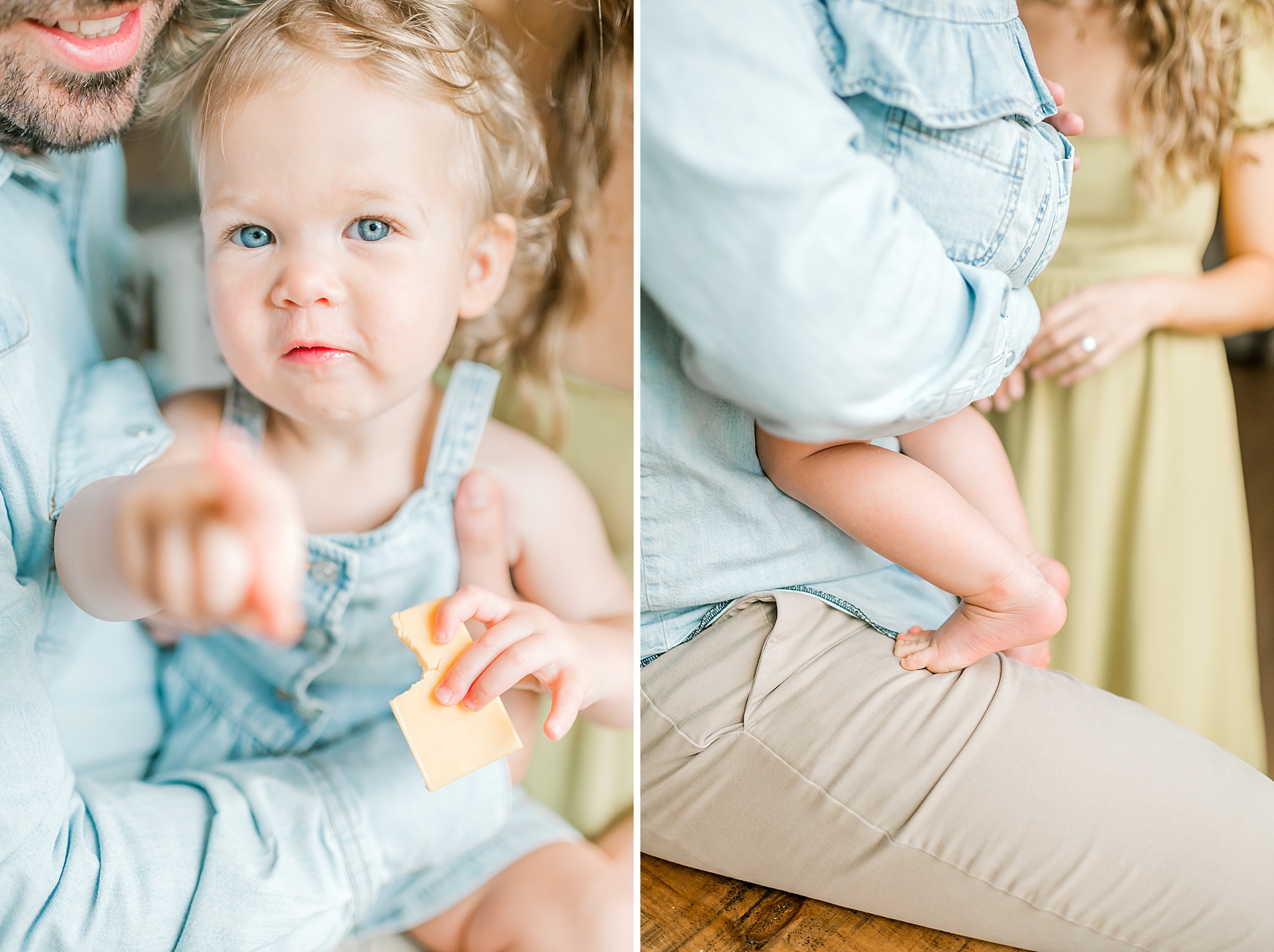 parents hold their little girl