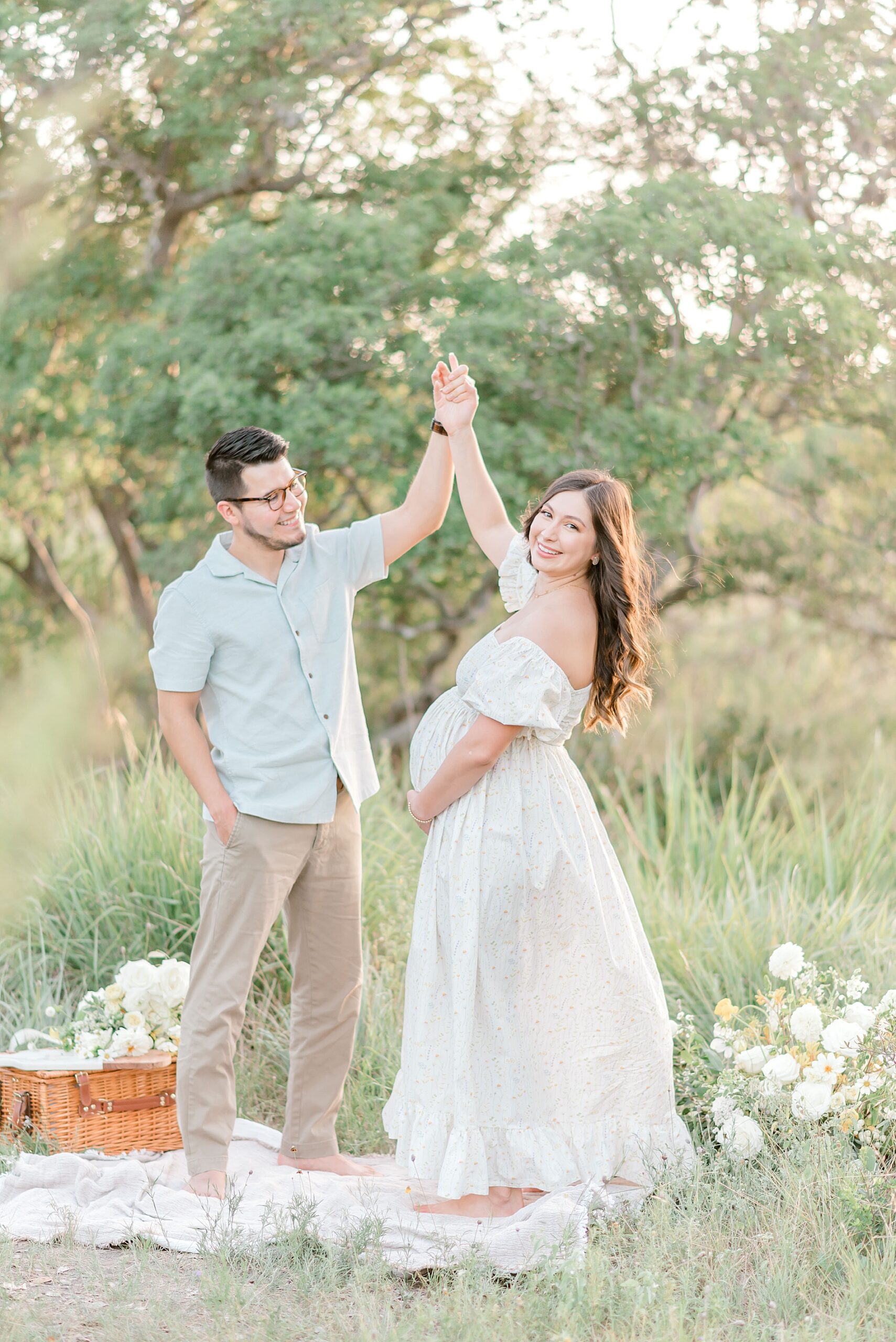 couple dance during Whimsical Maternity Session  