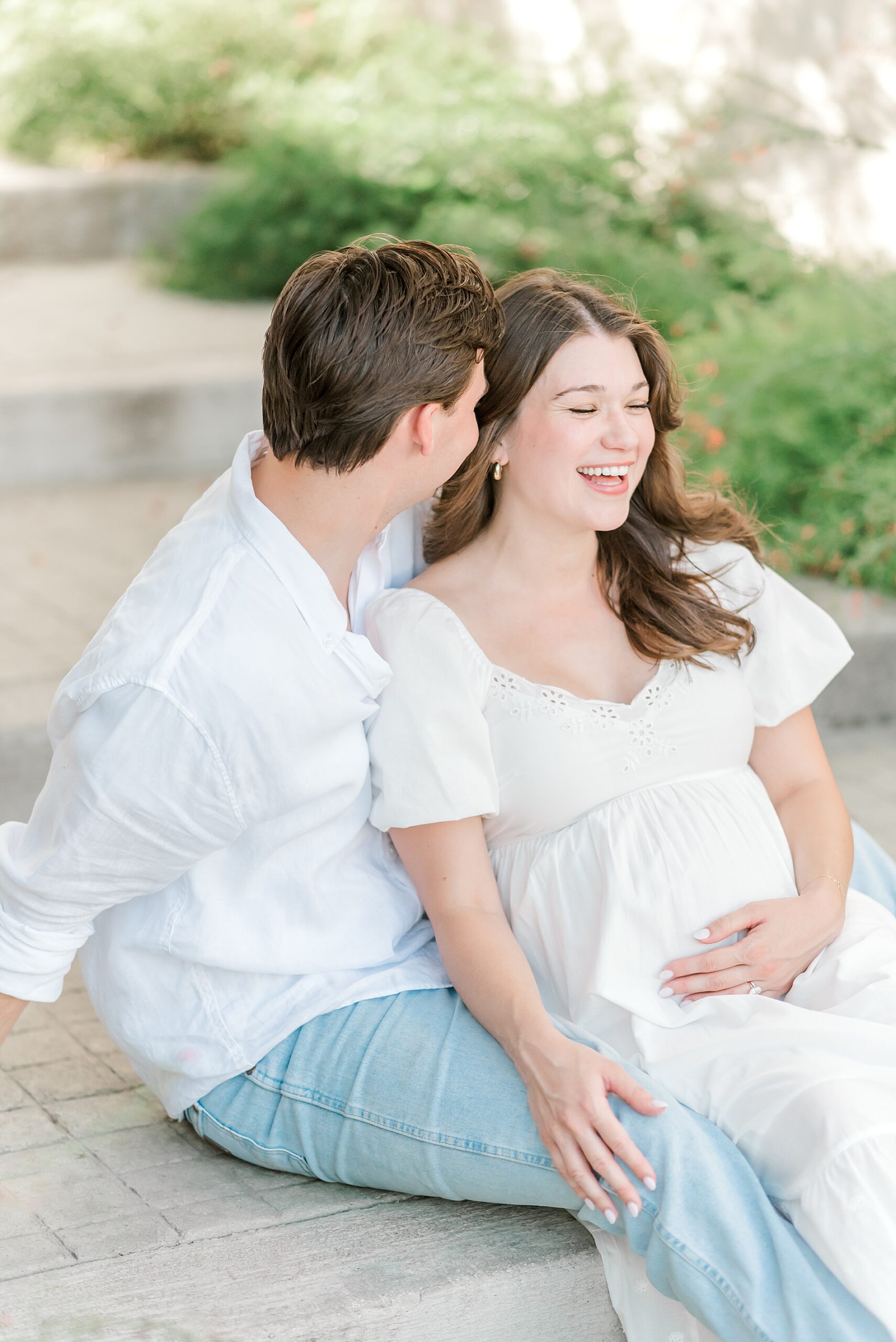 candid photos of couple during maternity session