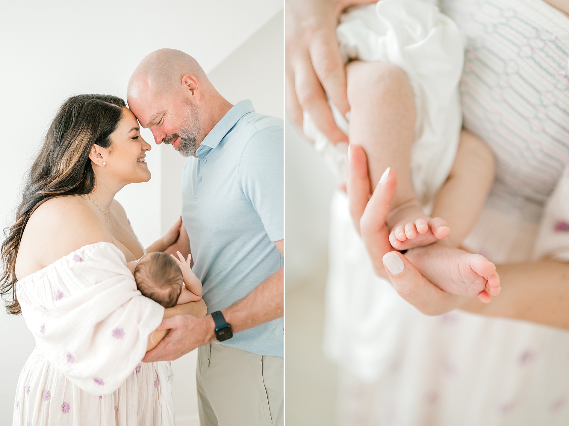 parents hold their newborn girl