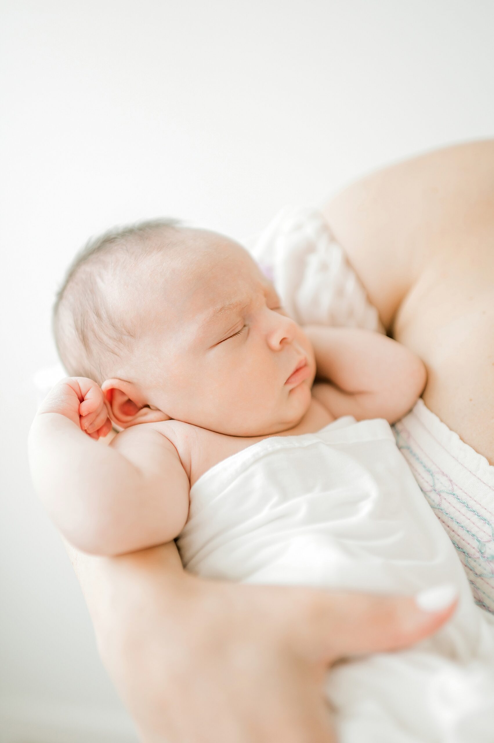 classic newborn photos of baby sleeping