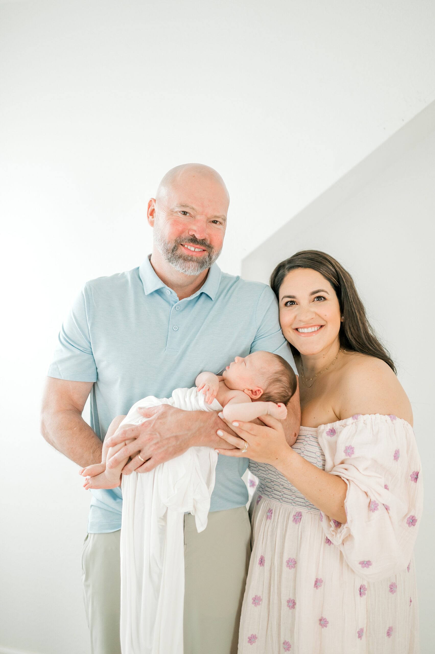 new family of three during Timeless Studio Newborn Session