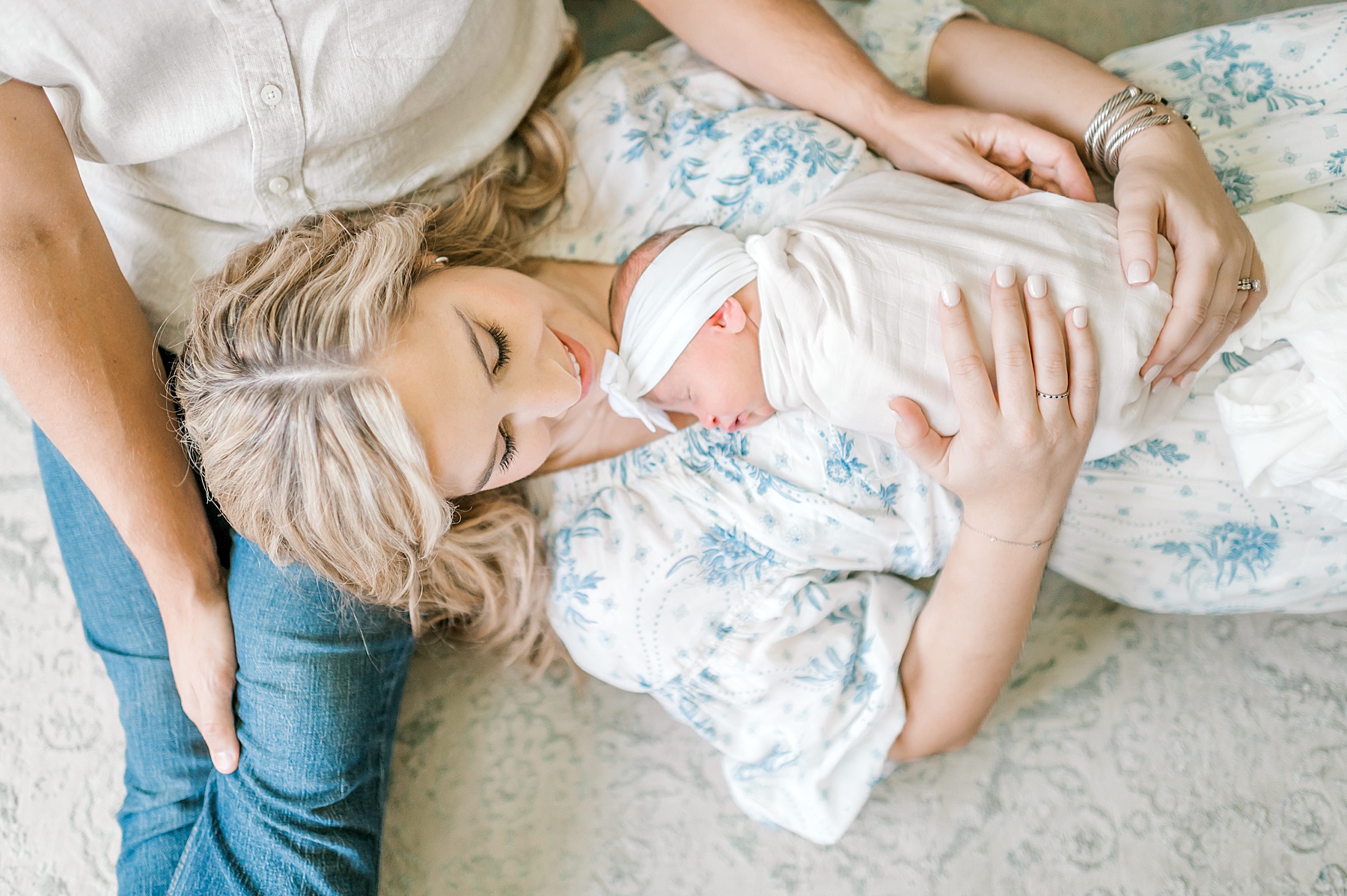 newborn lays on mom's chest