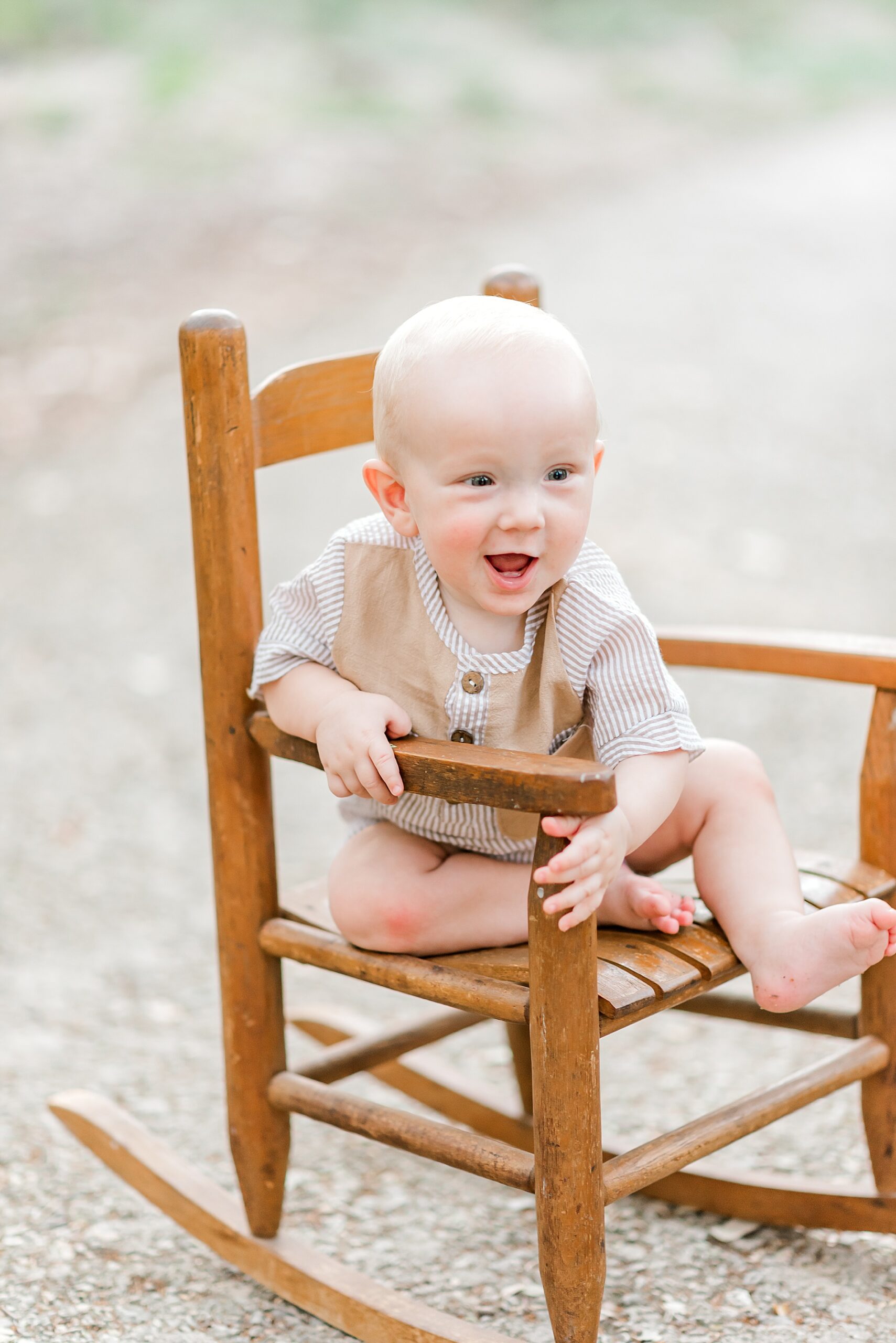 candid photo of little boy in rocking chair from  Brackenridge Park Family Session in San Antonio TX 