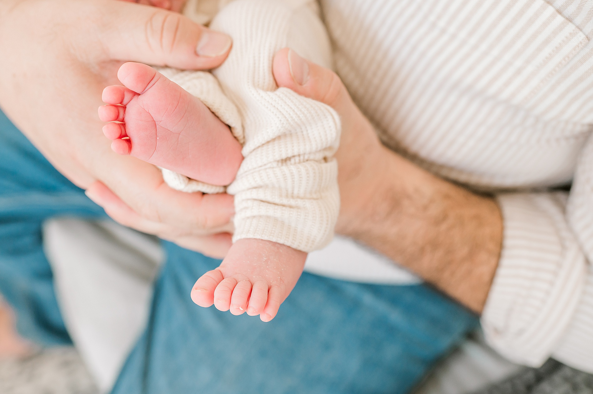 tiny toes and feet of newborn girl 