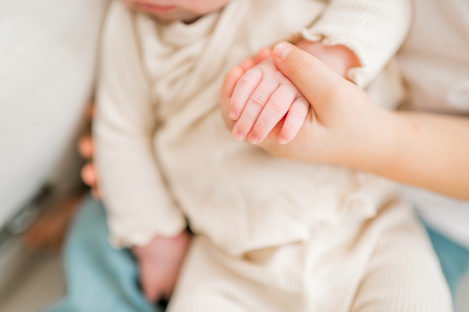 tiny fingers of newborn girl