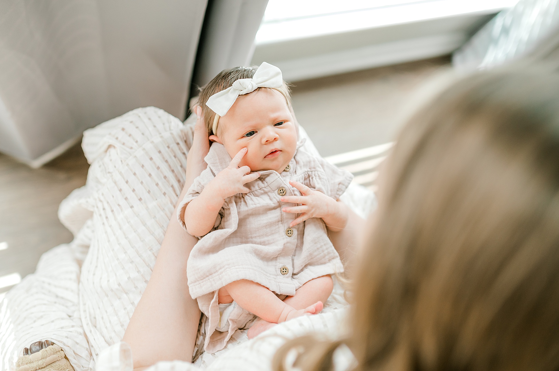 mom holds newborn