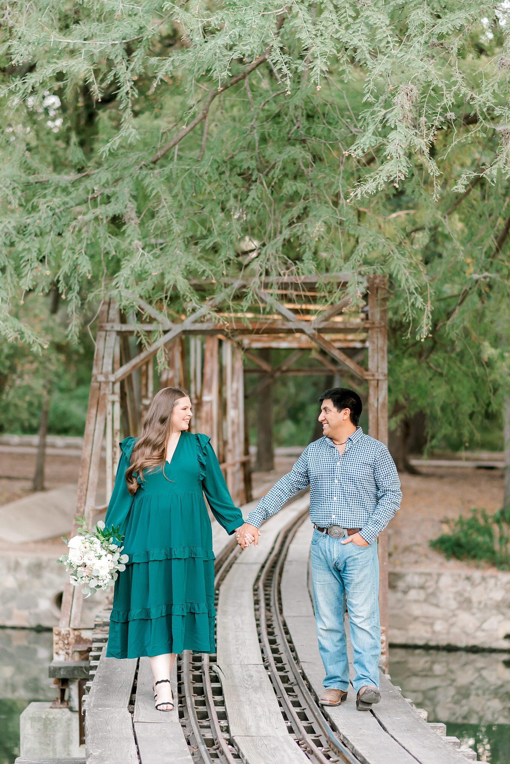 couple walk together holding hands