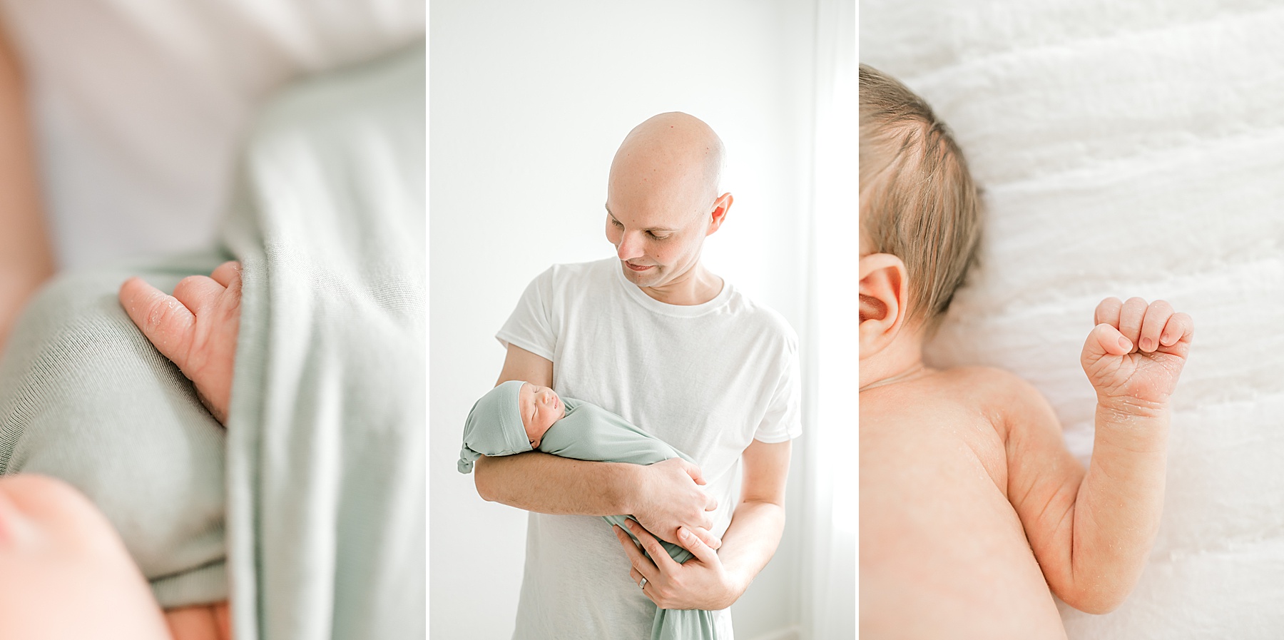 dad holds newborn boy