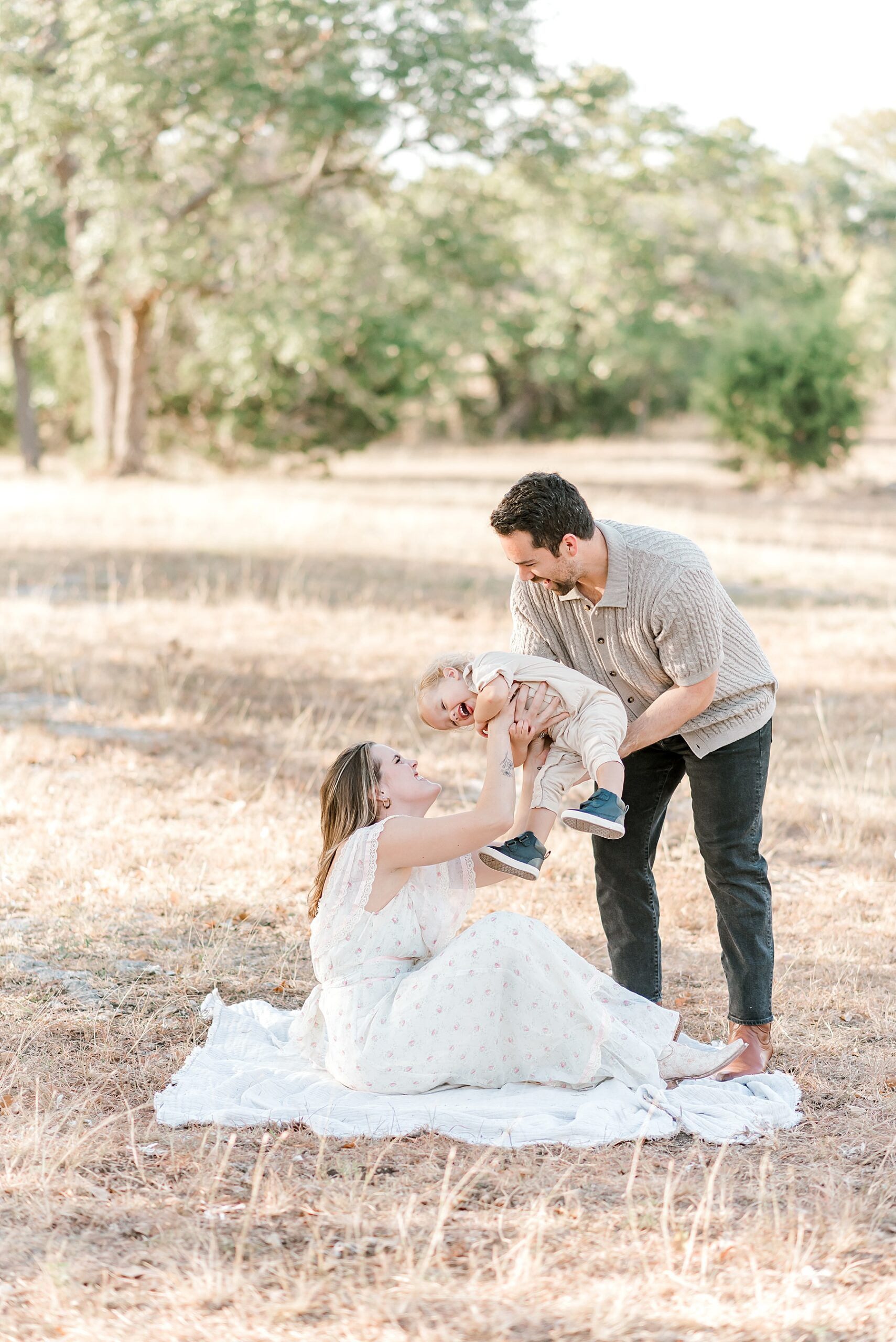 parents interact with their son during San Antonio family session