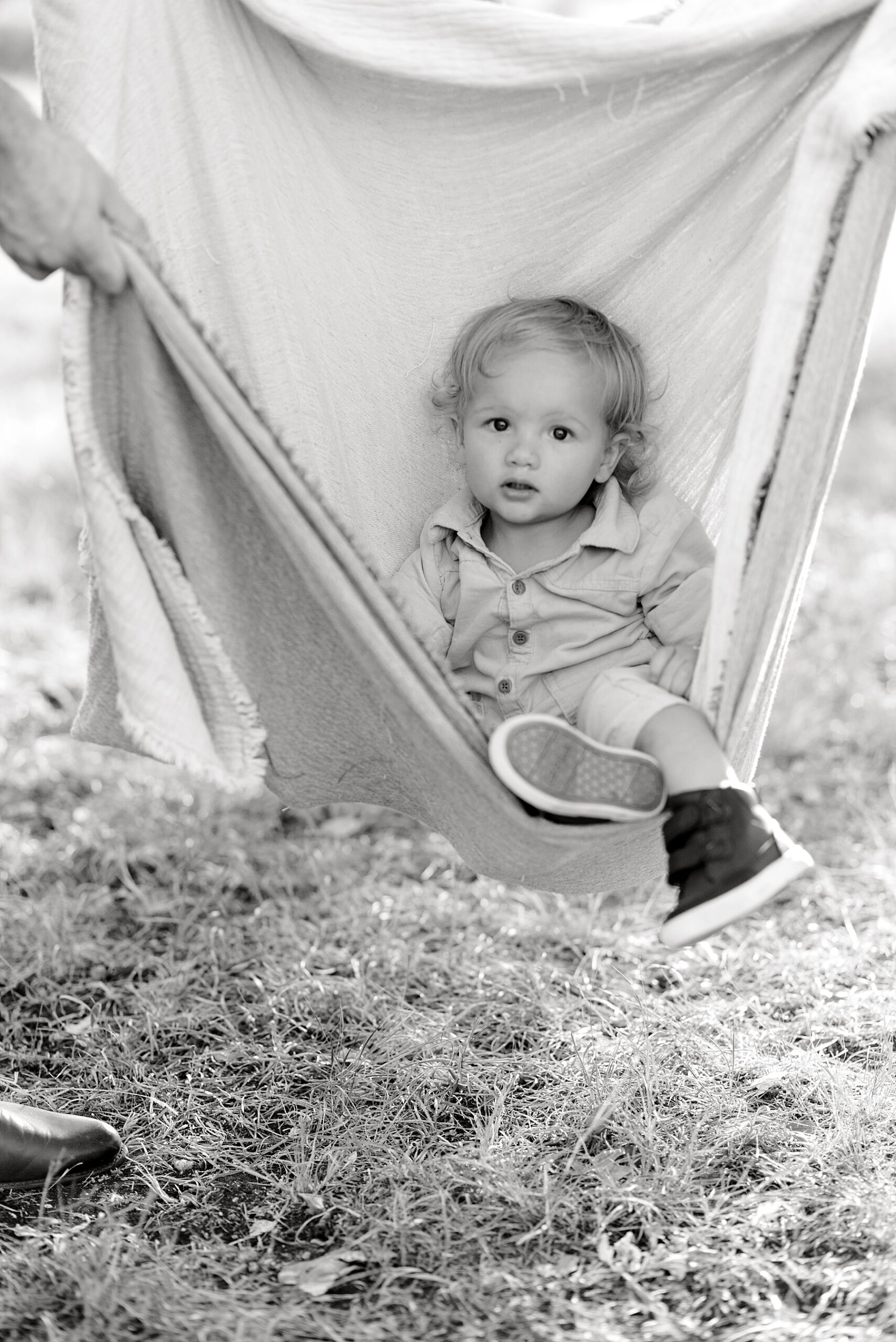 little boy in blanket