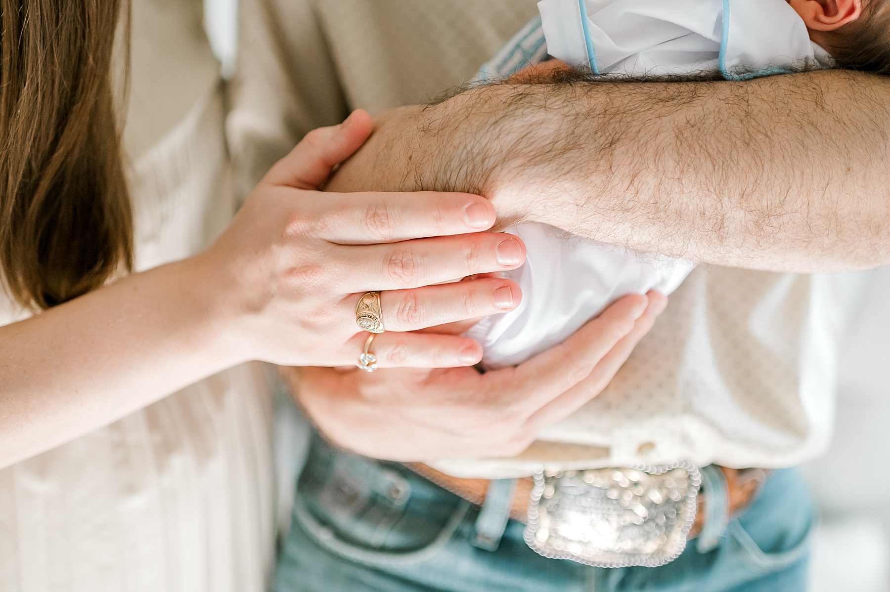 parents holding newborn