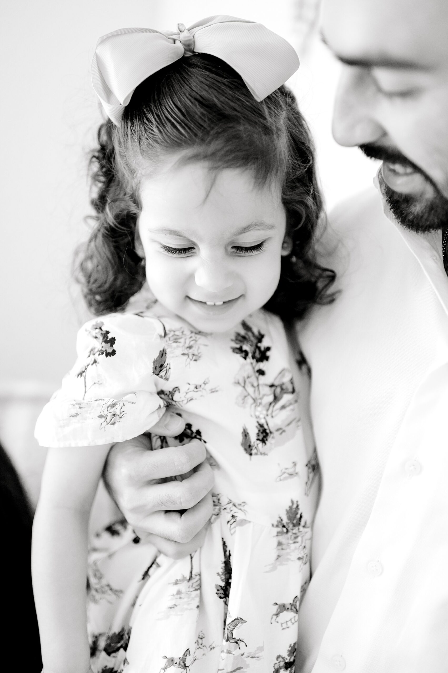 dad holds his little girl during San Antonio lifestyle session