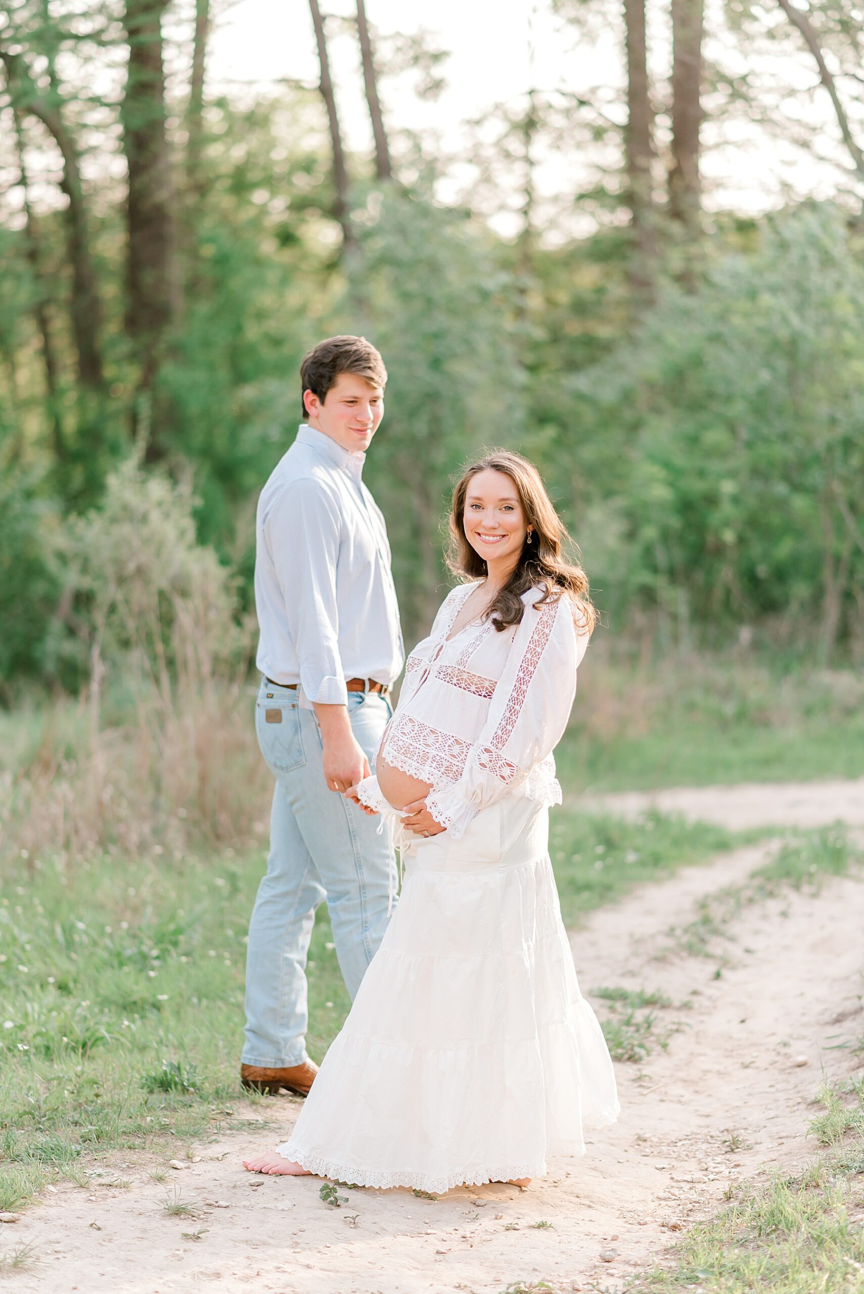 couple hold hands on trail at Cibolo Nature Center