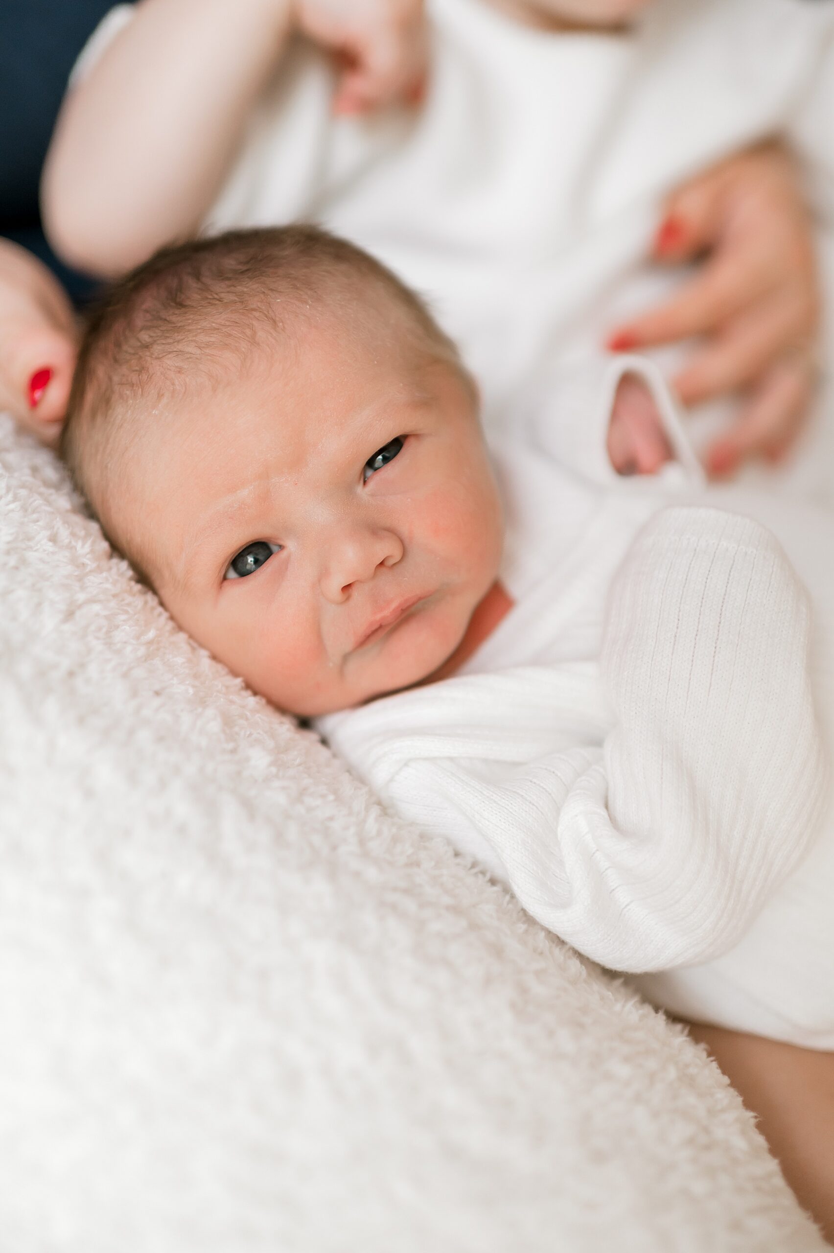 newborn opens eyes