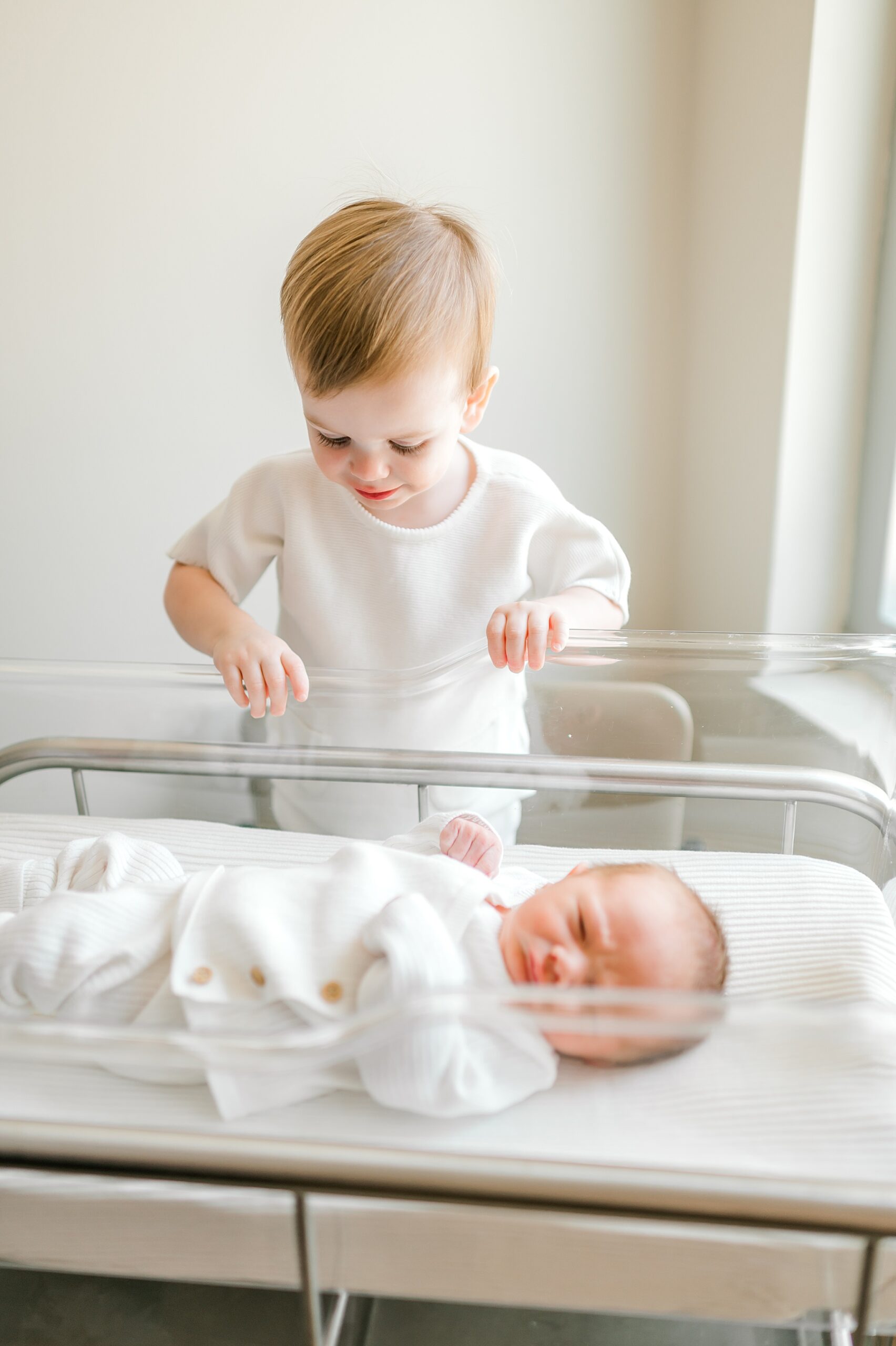 big brother looks over little brother