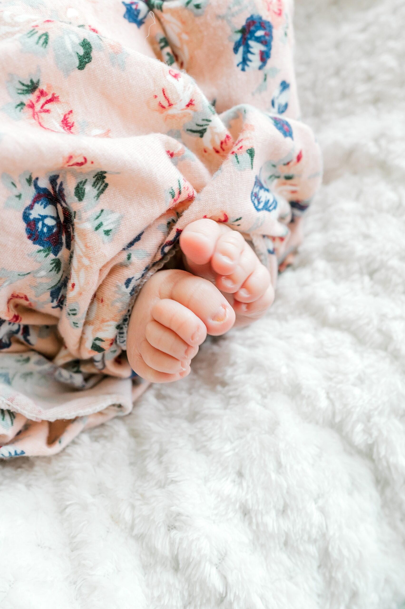 tiny toes of newborn girl