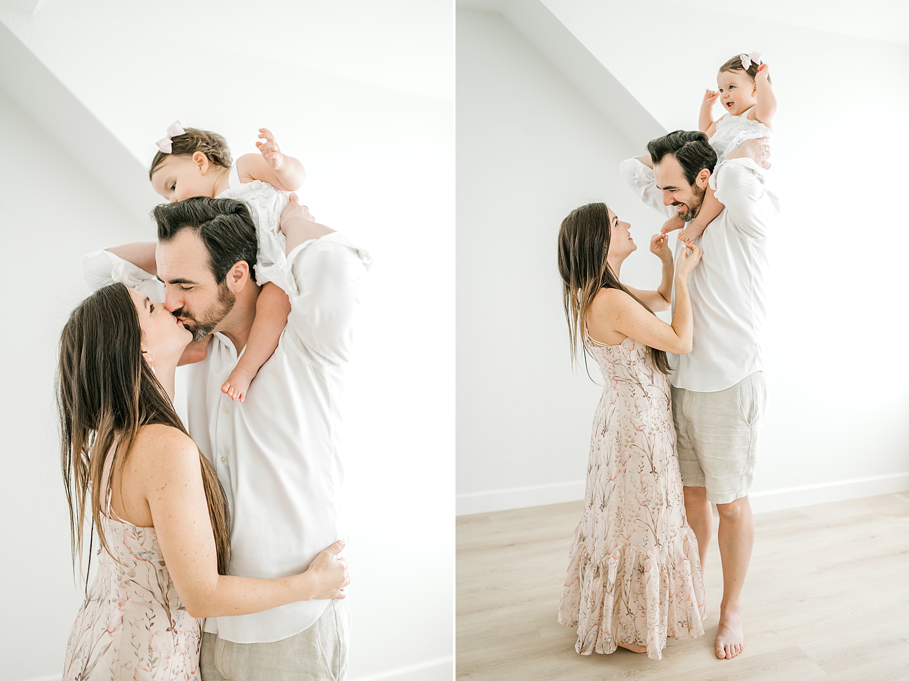 little girl sits on dad's shoulders