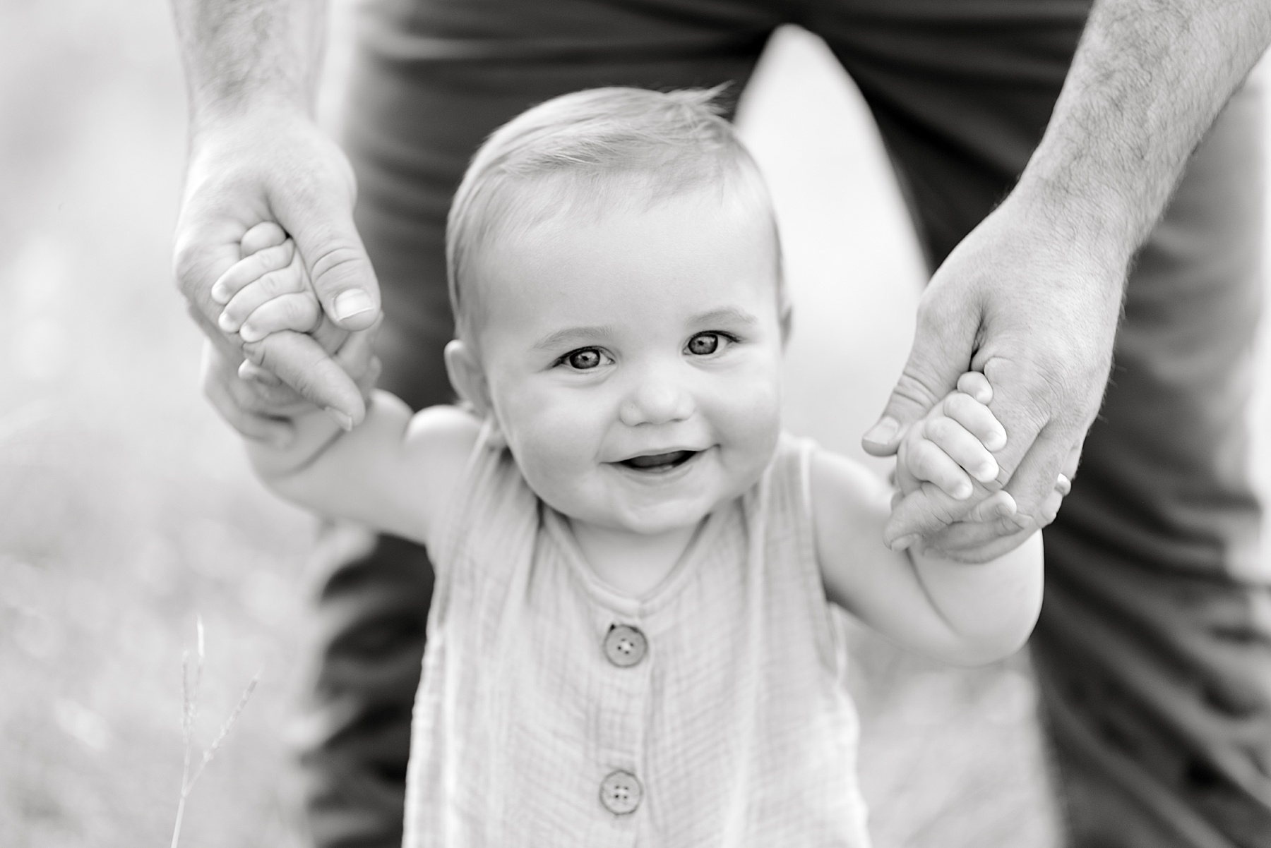 6 month old boy smiles during Texas milestone session