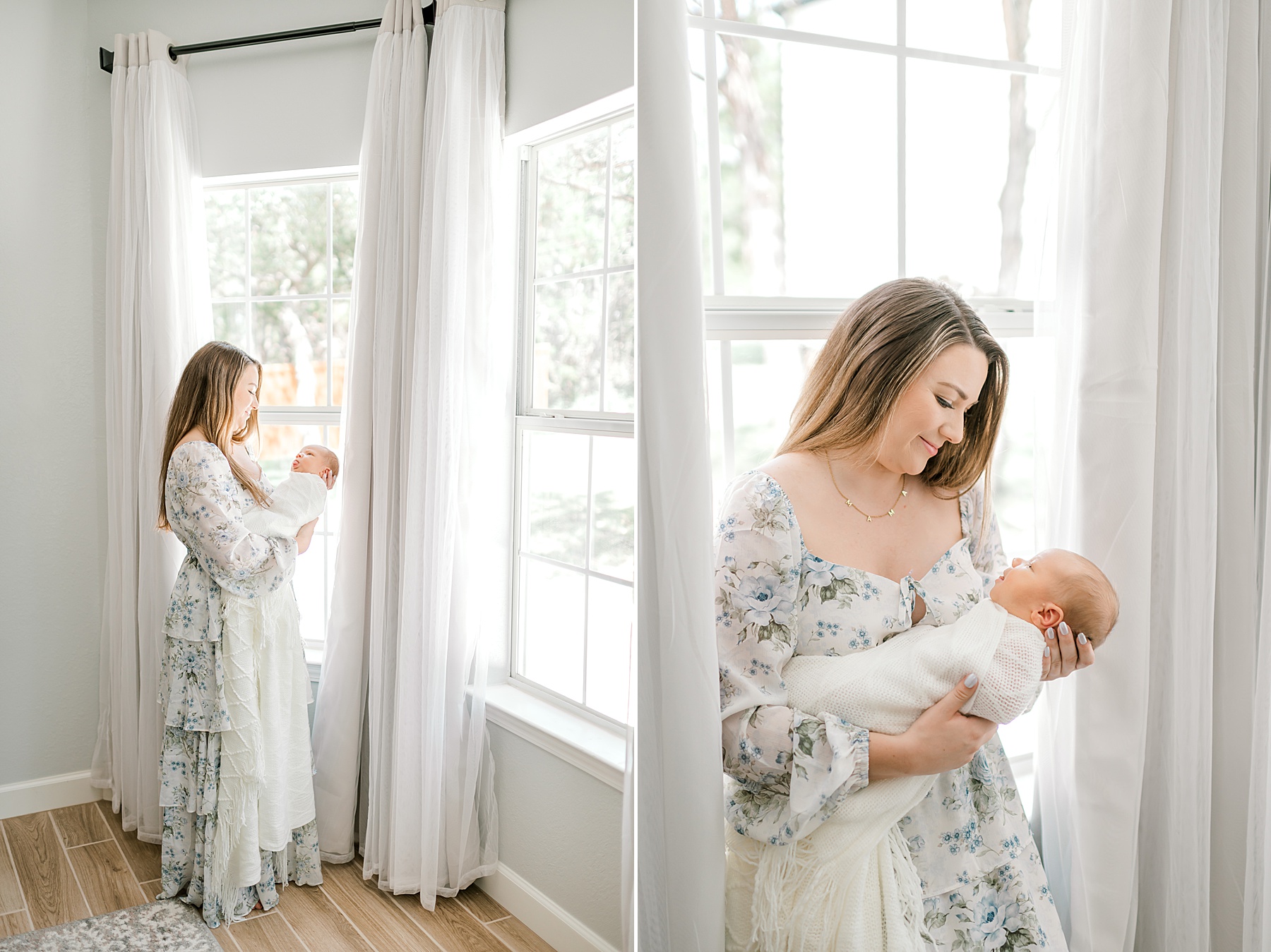 mom holds newborn by windows of home