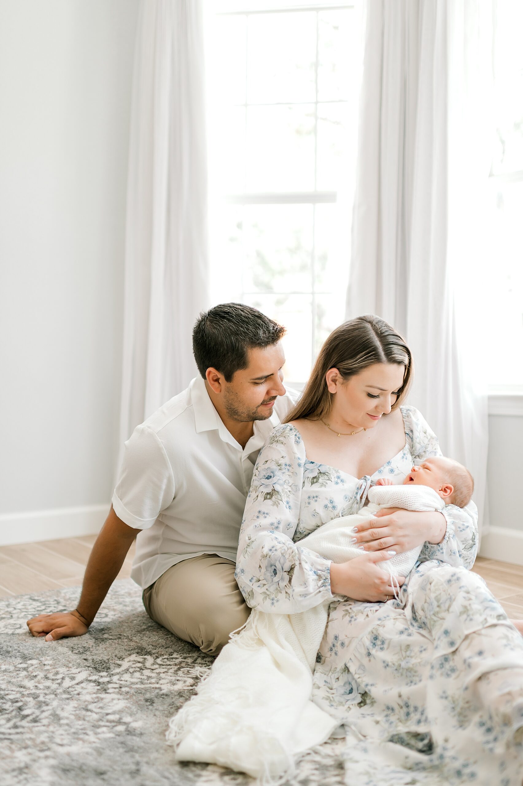 tender moments of family of three from Canyon Lake In-Home Newborn session