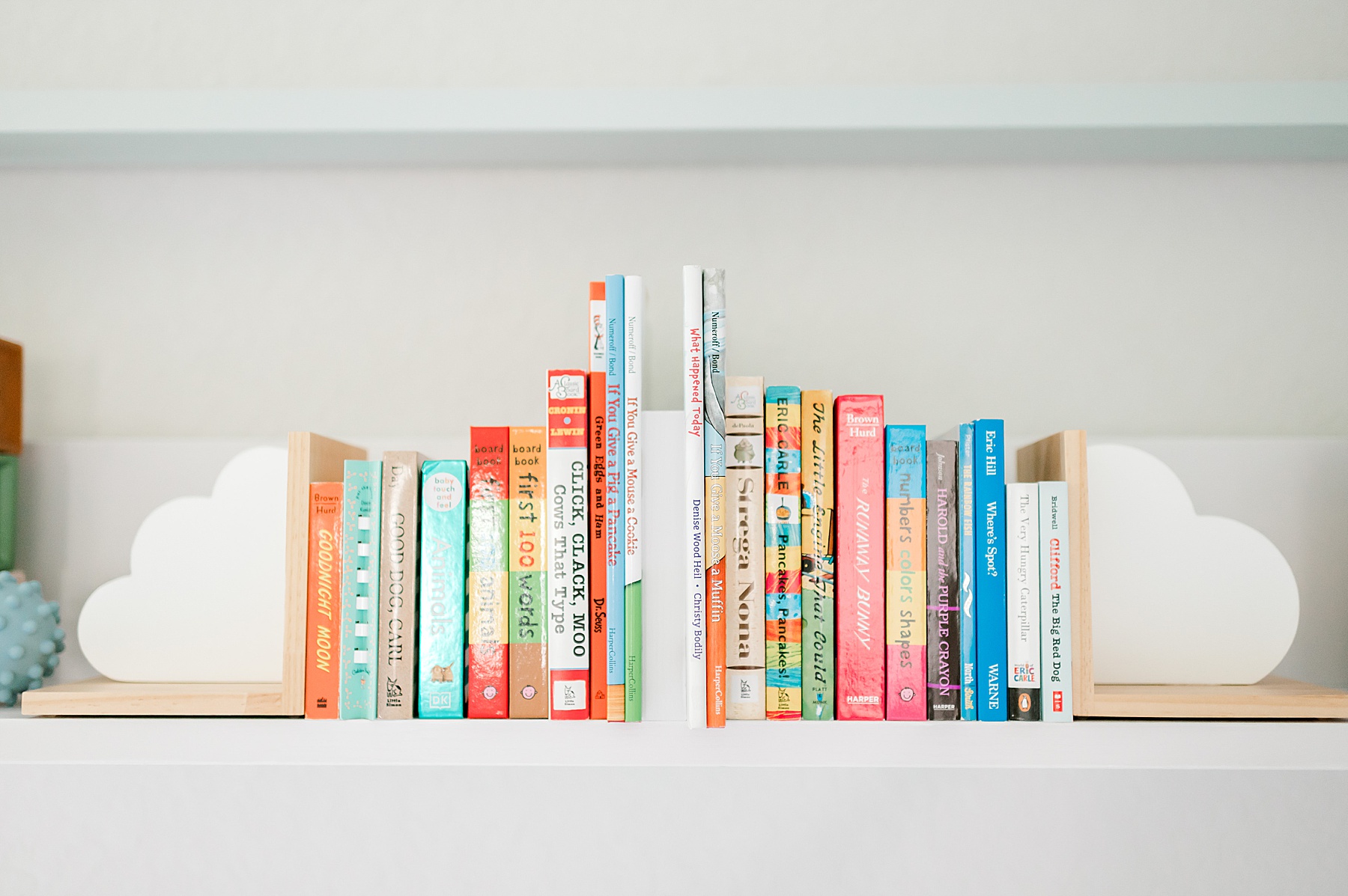 nursery bookshelf in San Antonio | Top 5 Questions To Ask Your Newborn Photographer