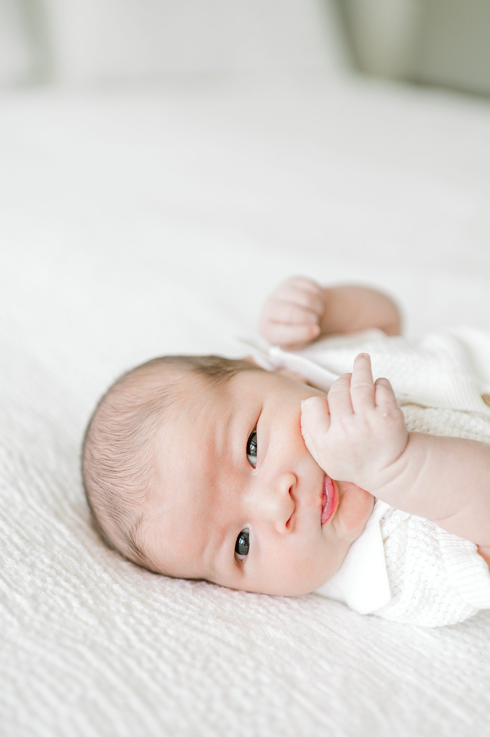 Newborn photographer in San Antonio captures newborn boy awake