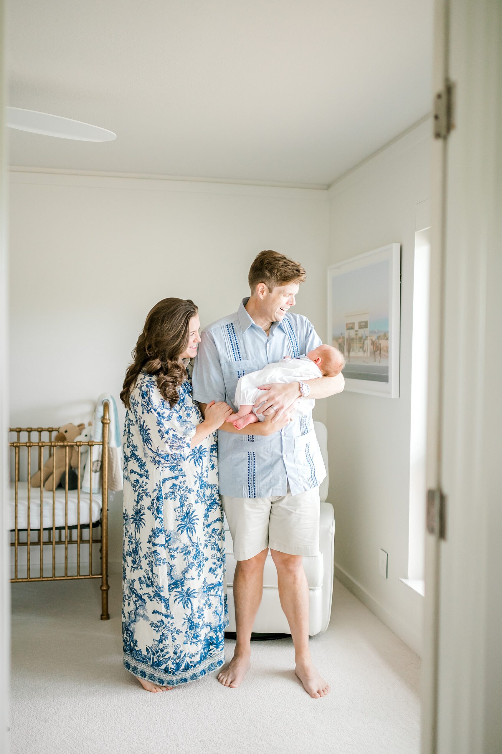 parents with newborn son during In-Home Older Newborn Session