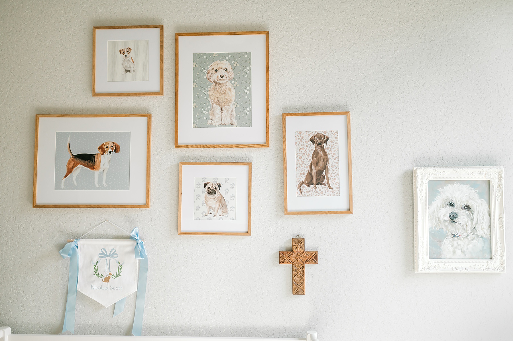 framed dog pictures in nursery