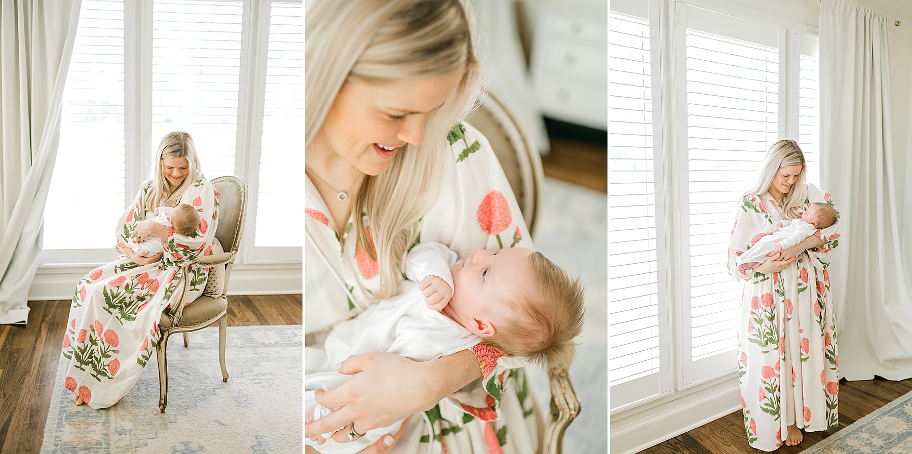 mom in floral dress holds newborn by the window 