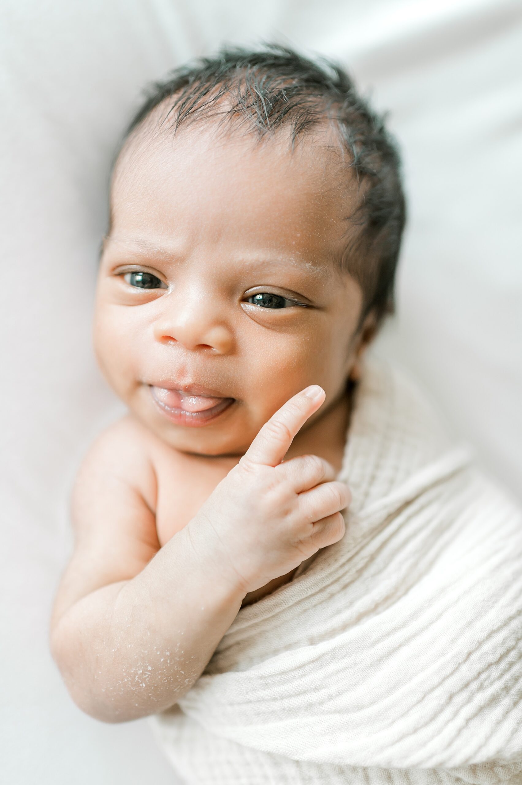 sweet expressions of newborn boy