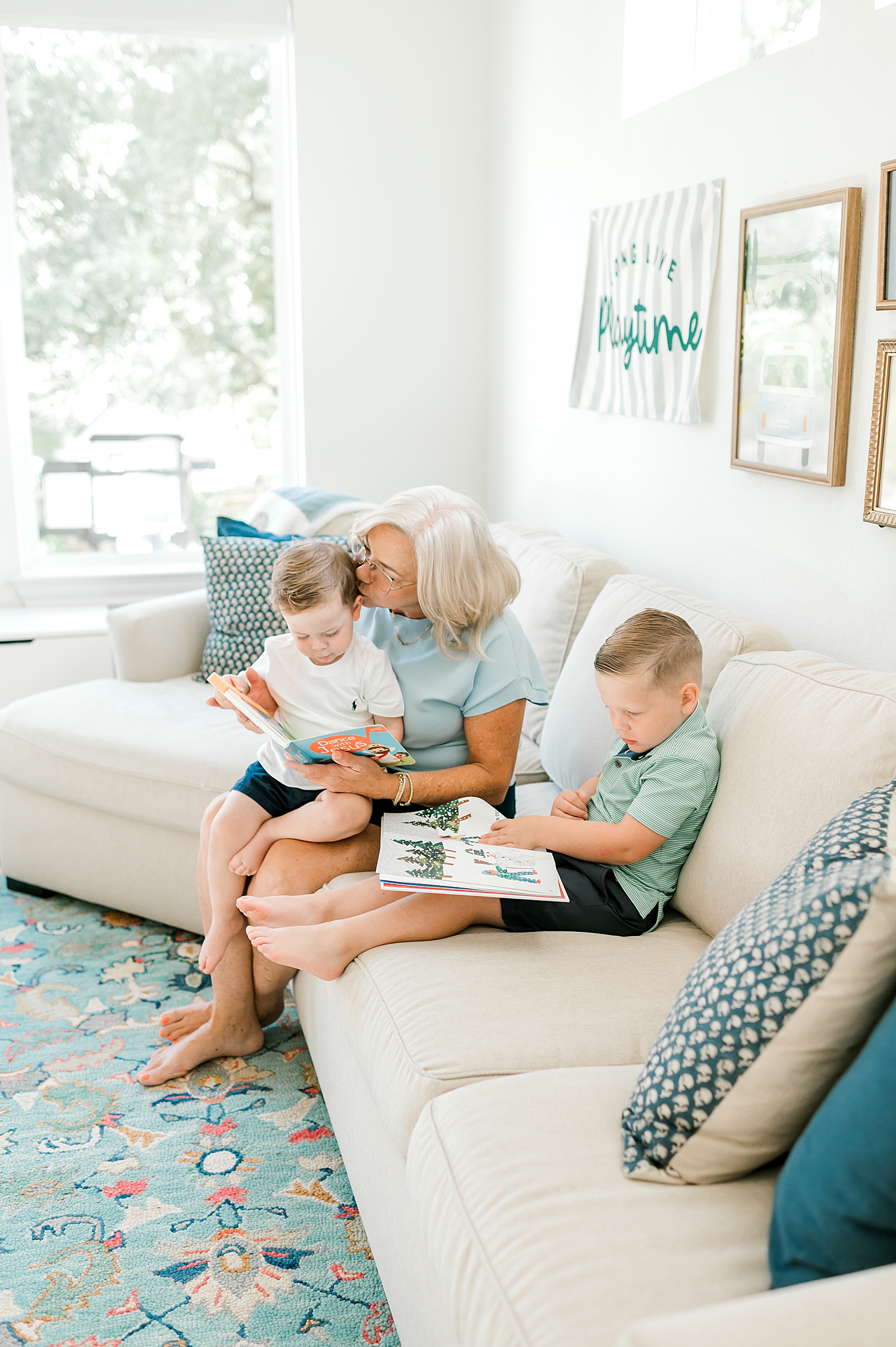 grandma sits with her grandchildren
