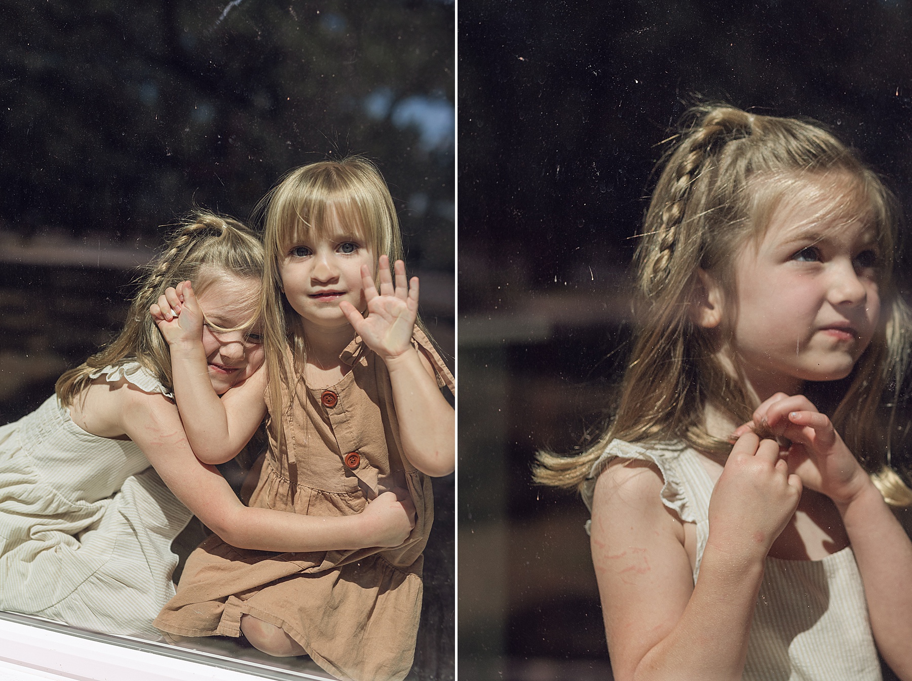 two little girls look out the window 