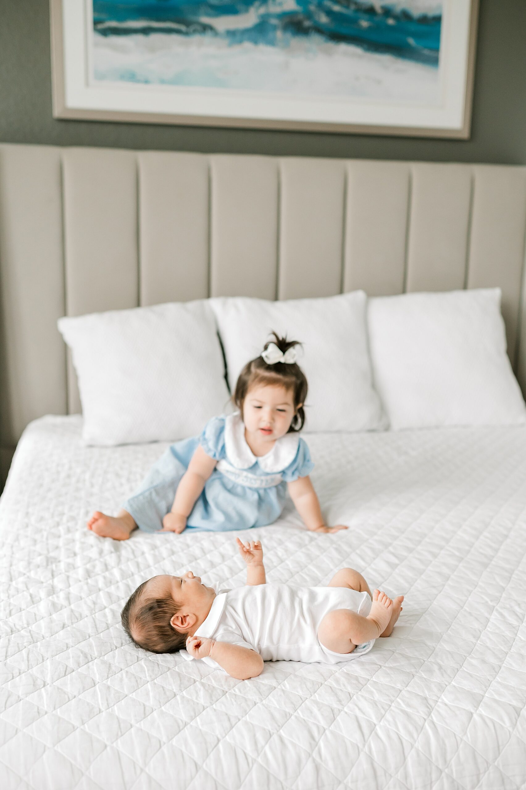 big sister with newborn brother