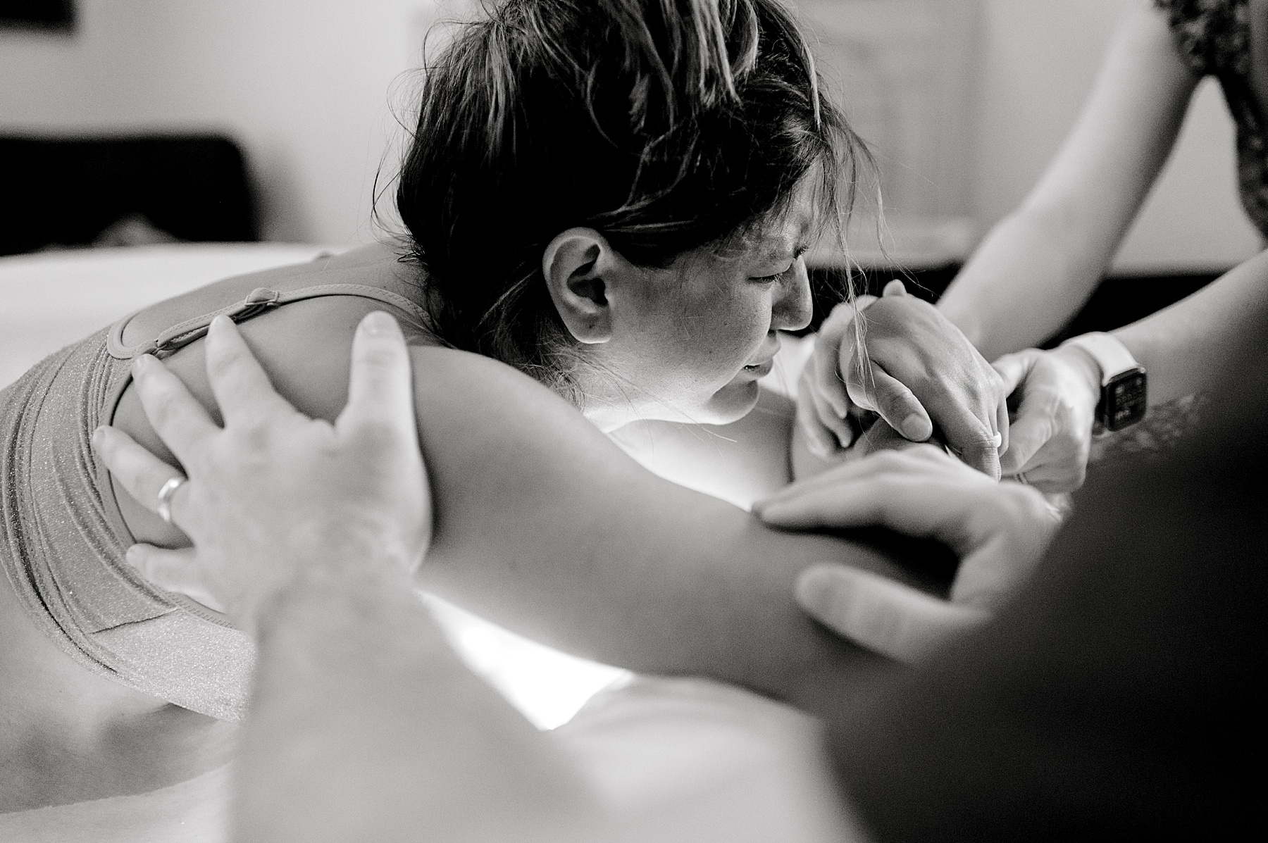 woman delivers baby at home 