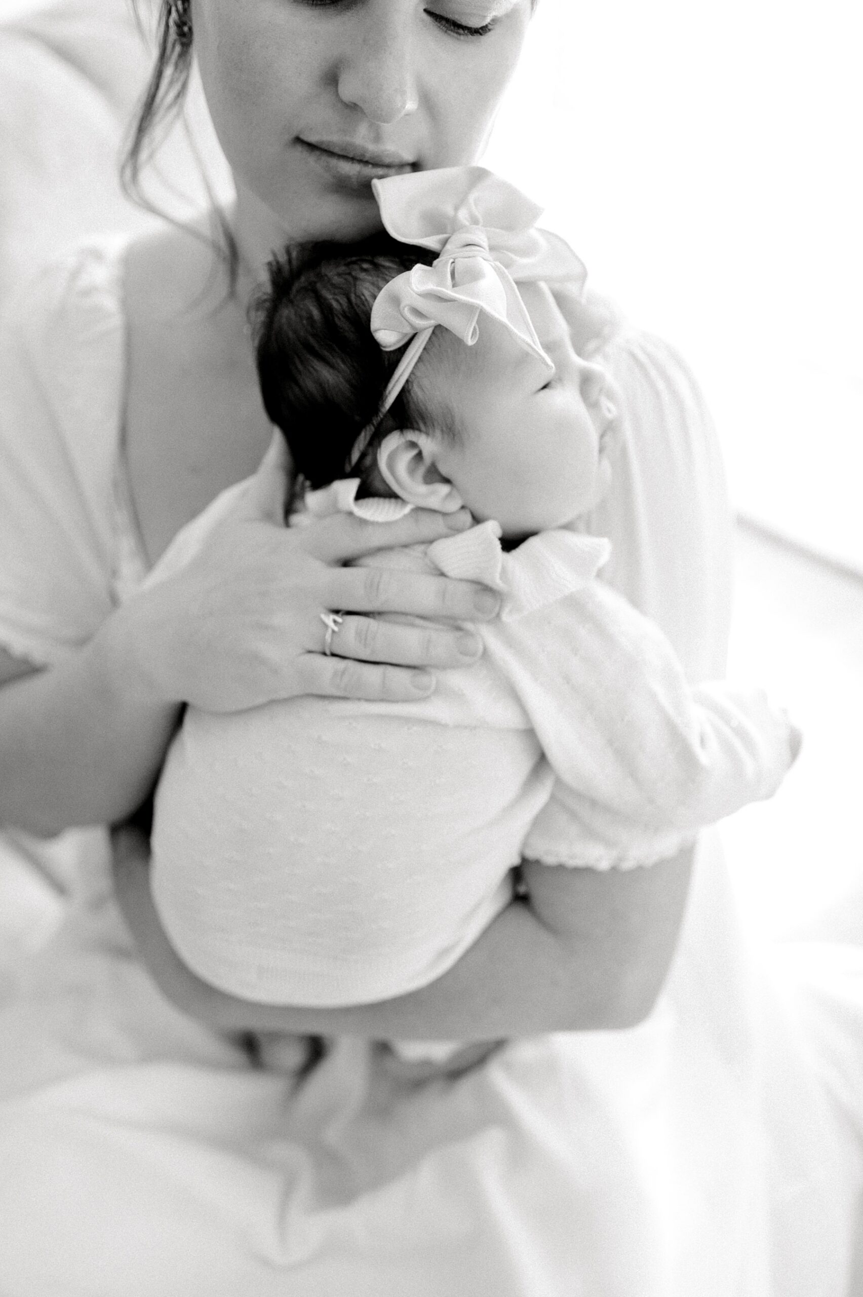 Why Your “Imperfect” Home is Perfect for Photos | timeless portraits of mom holding sleeping newborn 