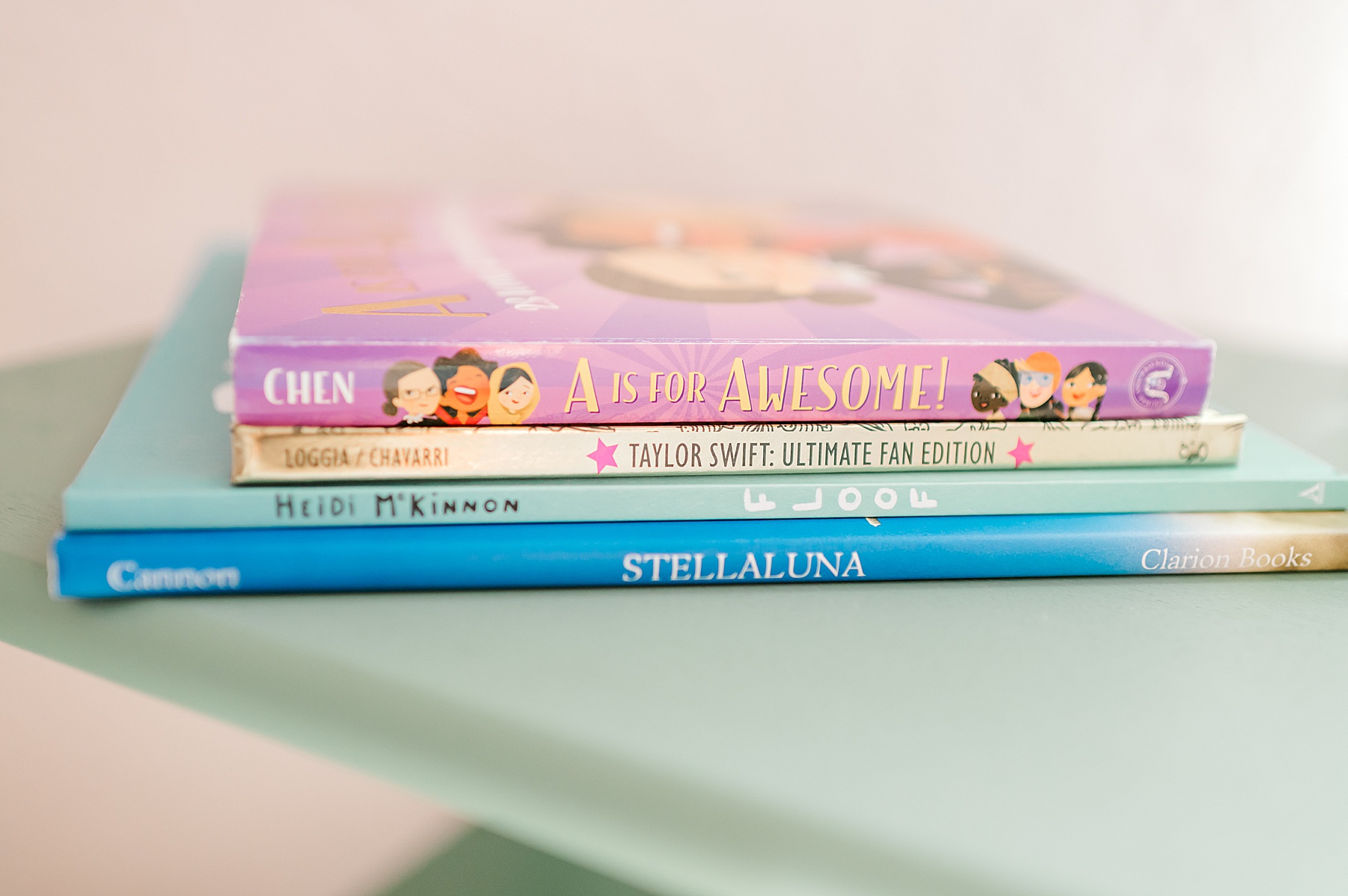 baby books on shelf in nursery
