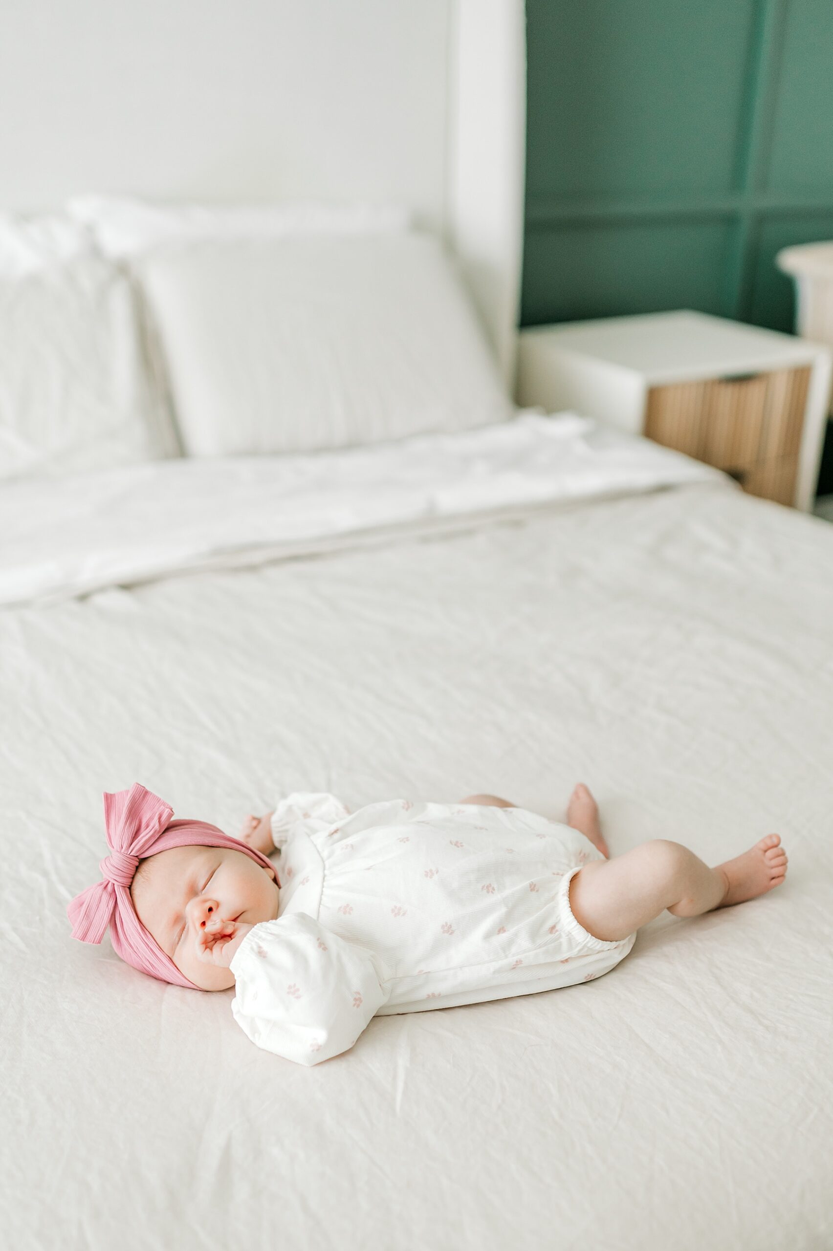 Tips to Prepare For An In-Home Newborn Session | Newborn girl sleeps on bed
