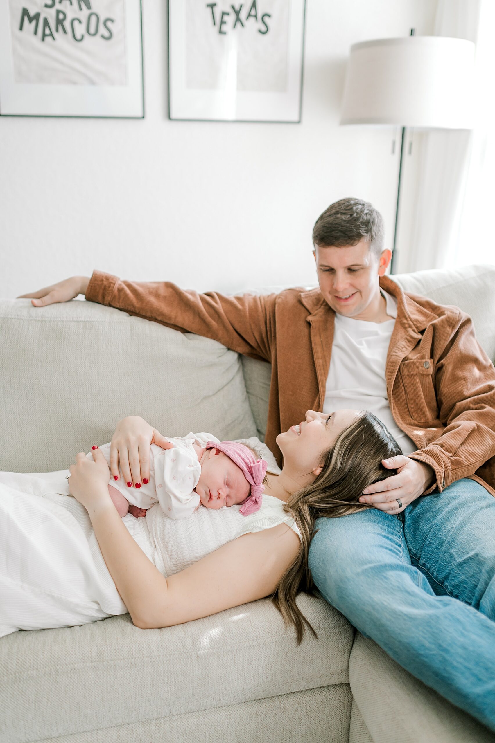 family portraits on couch during in-home newborn session in San Marco, TX